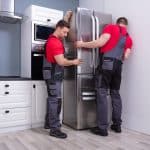 a person standing in a kitchen