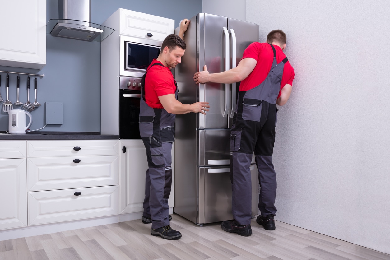 a person standing in a kitchen