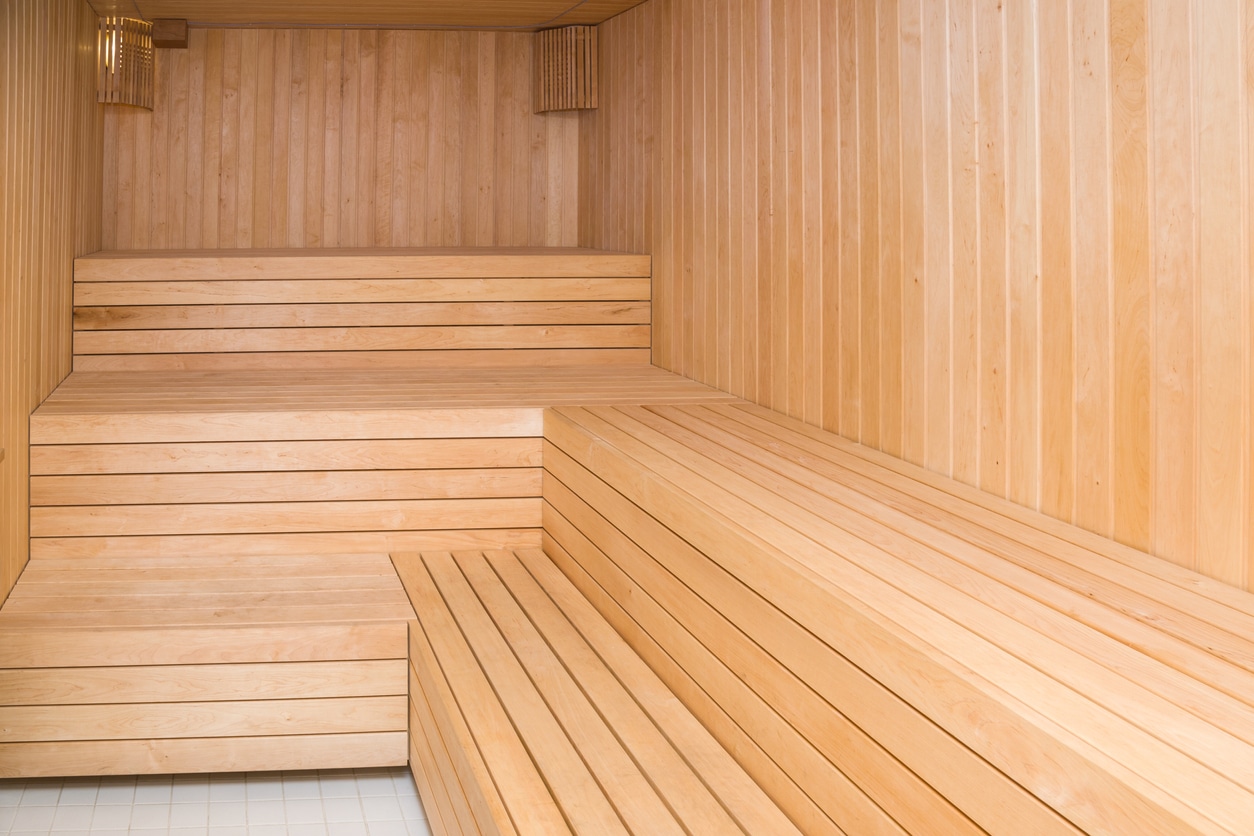 a wooden bench on a wood floor